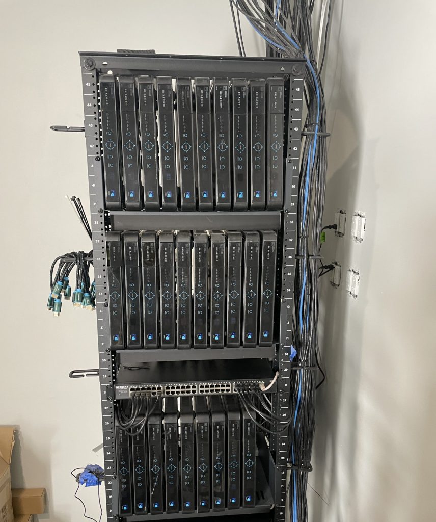 Equipment rack with organized cabling installed by Sky Tech Communications