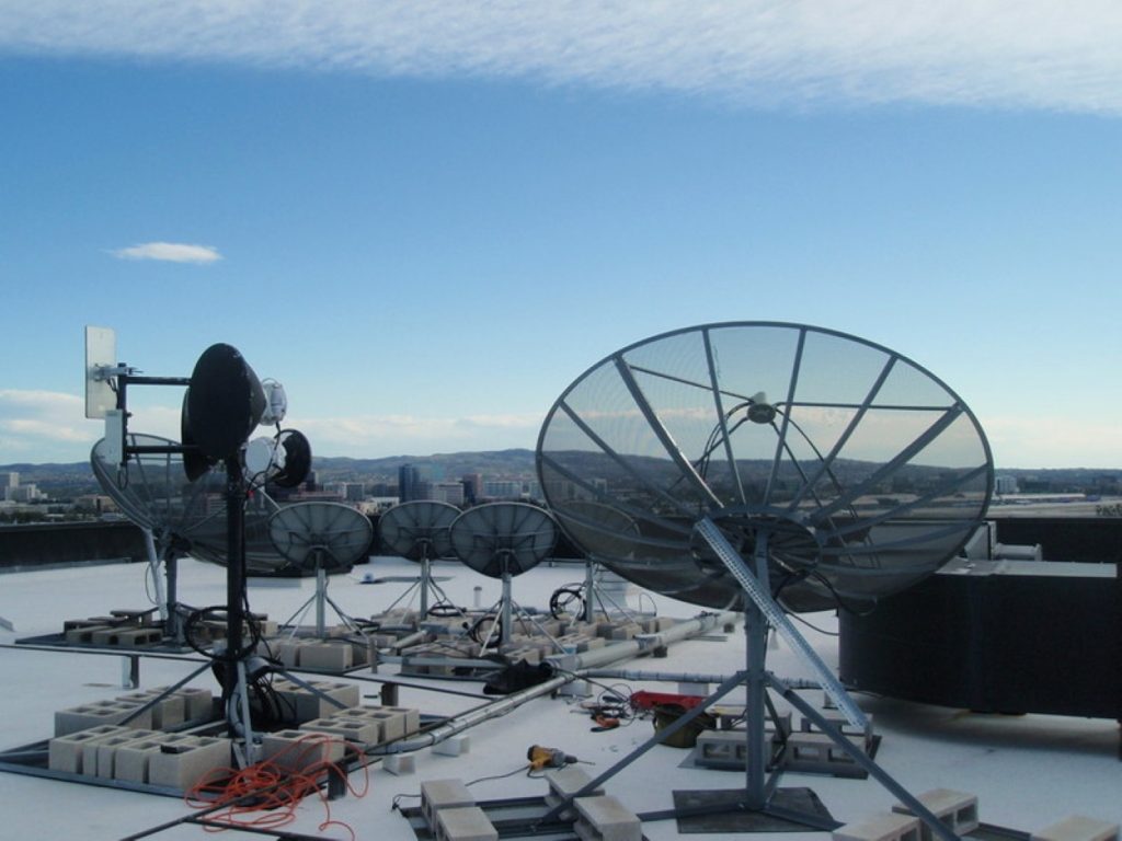 Roof-mounted satellite dish installed on a commercial building